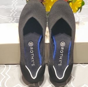 Rothy's black flats white halo